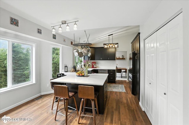 21009 River Park Dr, Eagle River, AK 99577 - dining area with dark wood-style flooring and baseboards