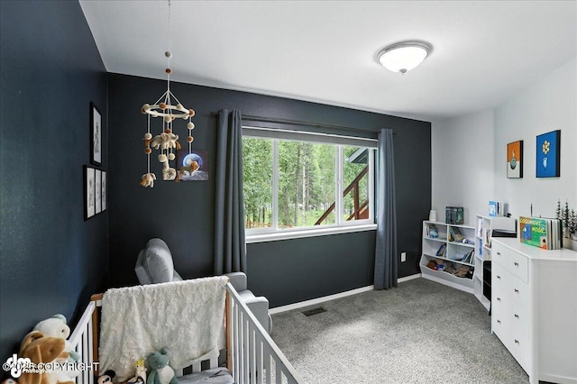21009 River Park Dr, Eagle River, AK 99577 - bedroom featuring carpet and a chandelier