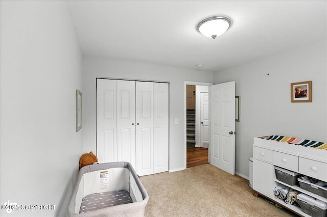 21009 River Park Dr, Eagle River, AK 99577 - bedroom featuring light carpet and a closet