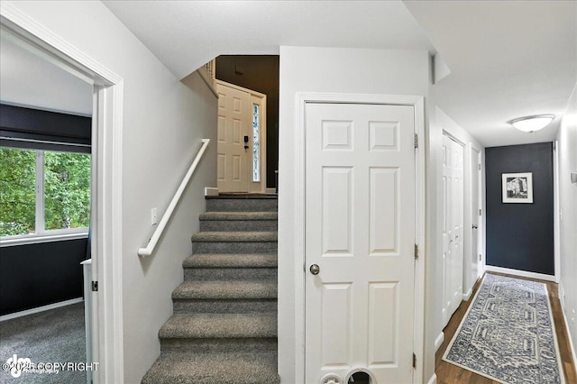 21009 River Park Dr, Eagle River, AK 99577 - stairs featuring baseboards