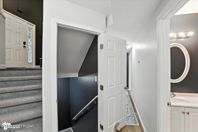 21009 River Park Dr, Eagle River, AK 99577 - staircase with wood finished floors and baseboards