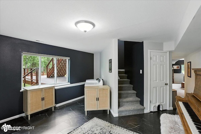 21009 River Park Dr, Eagle River, AK 99577 - stairs featuring baseboards and arched walkways