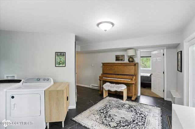 21009 River Park Dr, Eagle River, AK 99577 - laundry room featuring washing machine and dryer and a baseboard radiator