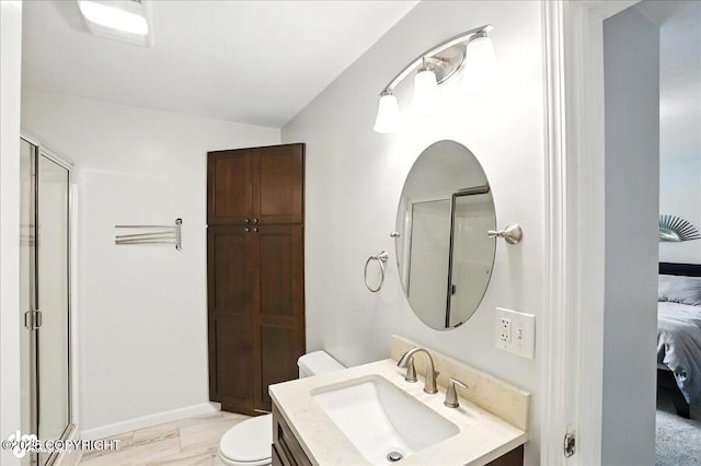 21009 River Park Dr, Eagle River, AK 99577 - bathroom with vanity, a shower stall, and connected bathroom