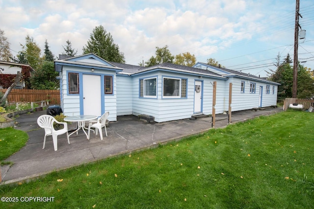 318 W 10th Ave, Anchorage, AK 99501 - back of house featuring a patio area