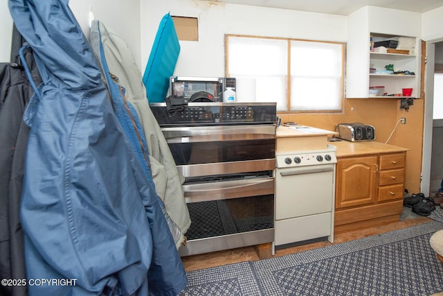 318 W 10th Ave, Anchorage, AK 99501 - kitchen featuring white range with electric cooktop, range, and open shelves