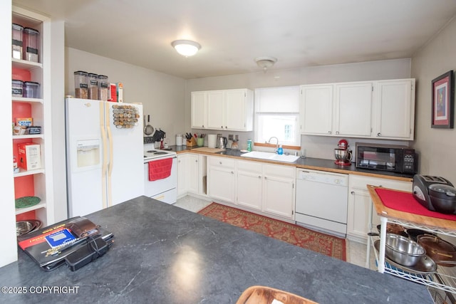 326 W 10th Ave, Anchorage, AK 99501 - kitchen with white appliances, white cabinetry, open shelves, and dark countertops