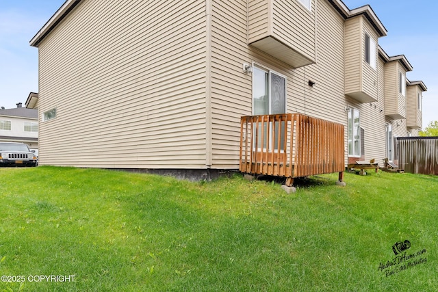 6507 Kara Sue Loop # 83, Anchorage, AK 99504 - view of side of home with a wooden deck