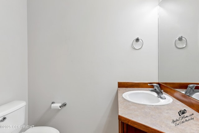 6507 Kara Sue Loop # 83, Anchorage, AK 99504 - bathroom featuring toilet and vanity