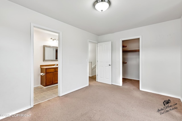 6507 Kara Sue Loop # 83, Anchorage, AK 99504 - unfurnished bedroom with carpet floors, a walk in closet, and ensuite bath
