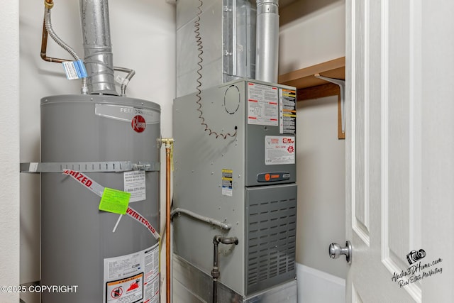 6507 Kara Sue Loop # 83, Anchorage, AK 99504 - utility room featuring secured water heater and heating unit