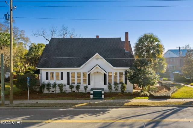 view of new england style home