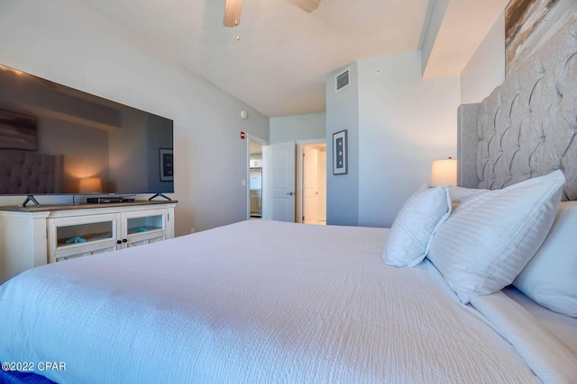 bedroom with ceiling fan and visible vents