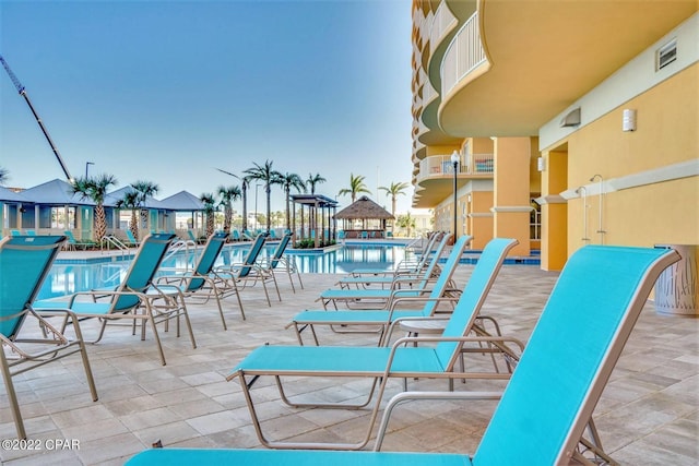 view of patio / terrace with a community pool