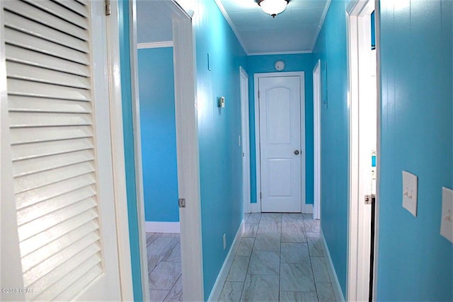 hallway featuring light tile floors