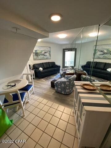 4715 Thomas Dr Unit E-13, Panama City Beach, FL 32408 - living room with light tile patterned flooring