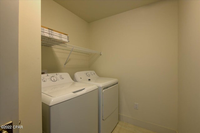 laundry room with washer and dryer