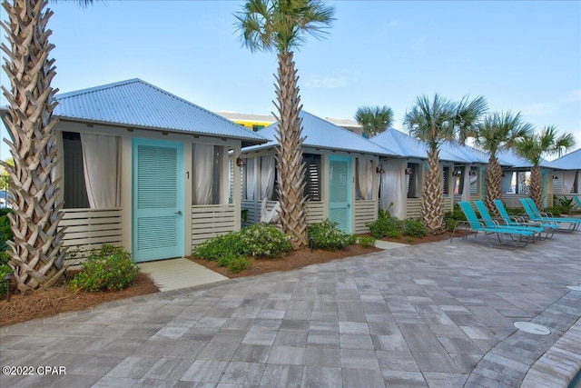 view of front of home featuring a patio