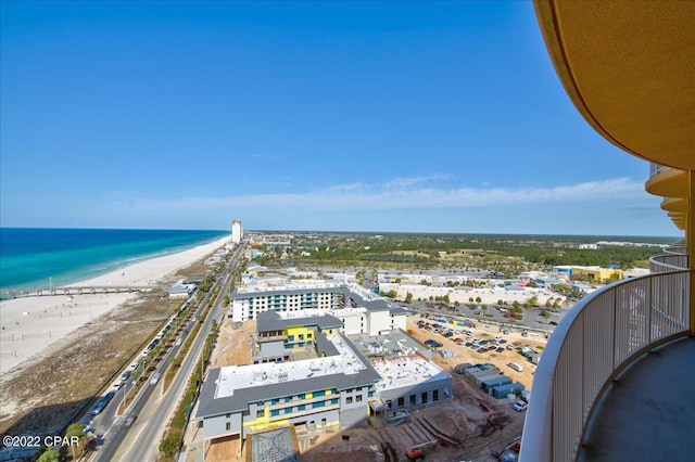 exterior space with a beach view and a water view