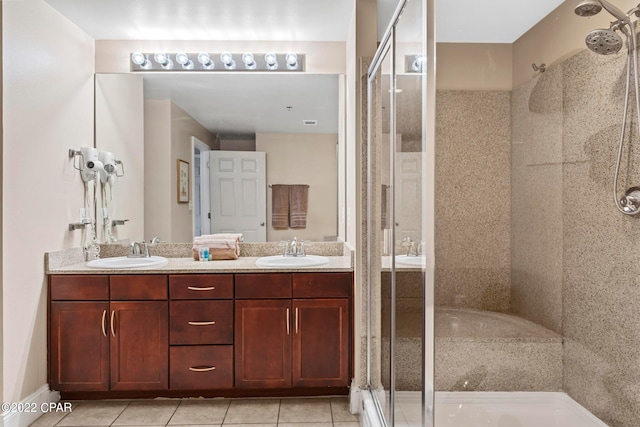 bathroom featuring separate shower and tub, double sink, large vanity, and tile flooring