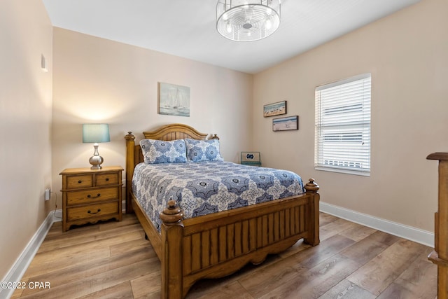 bedroom with light wood-type flooring