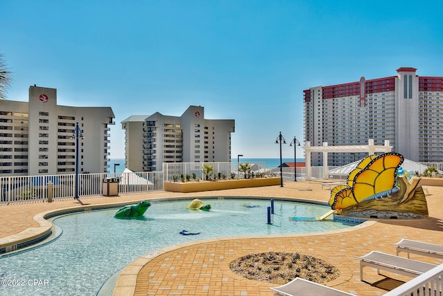 view of pool featuring a patio area