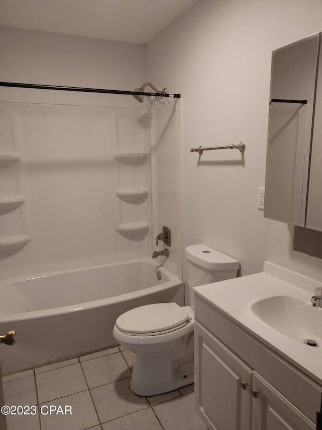 full bathroom featuring toilet, shower / washtub combination, vanity, and tile flooring