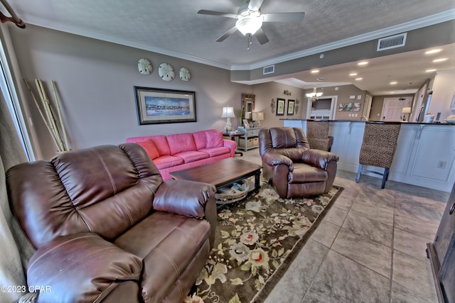 tiled living room with a textured ceiling, crown molding, and ceiling fan with notable chandelier