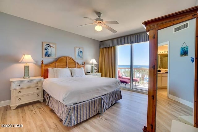 bedroom featuring light hardwood / wood-style floors, connected bathroom, access to exterior, and ceiling fan