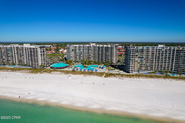 drone / aerial view with a view of the beach and a water view