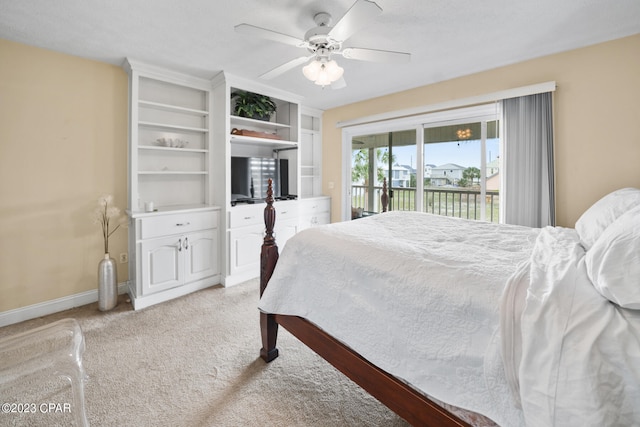 bedroom with access to exterior, light colored carpet, and ceiling fan