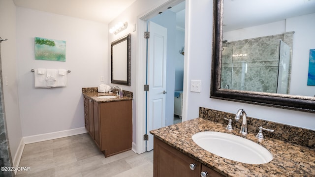 bathroom with tile floors and dual bowl vanity