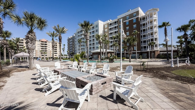 exterior space featuring a gazebo and a community pool