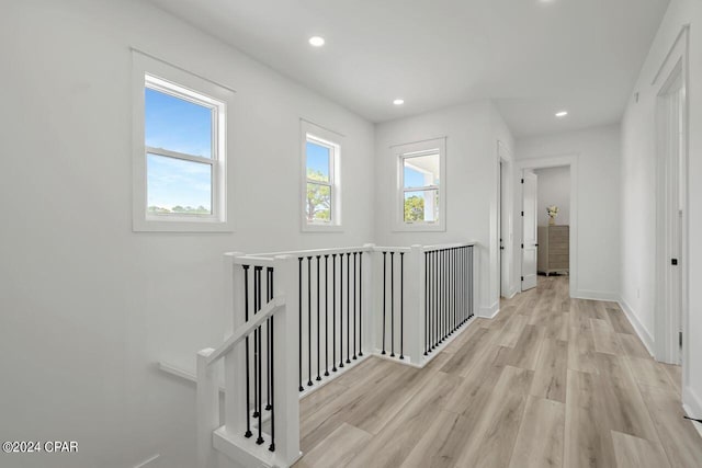 corridor featuring light hardwood / wood-style flooring