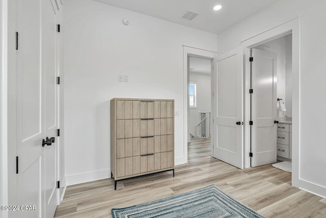 sitting room with light hardwood / wood-style floors