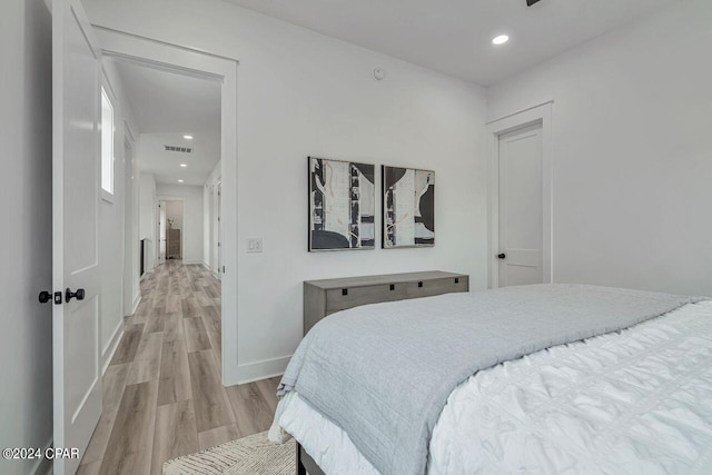 bedroom featuring light wood-type flooring