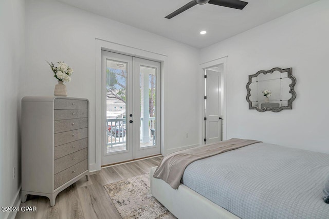 bedroom featuring light hardwood / wood-style floors, ceiling fan, and access to exterior