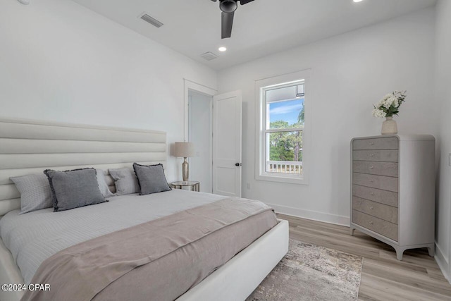 bedroom featuring ceiling fan and light wood-type flooring