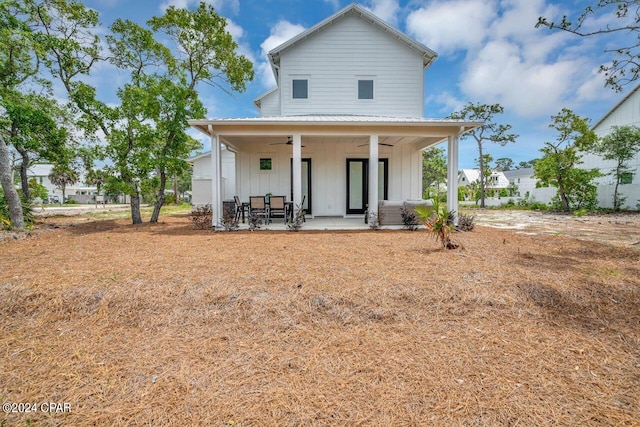 rear view of house with a patio and ceiling fan