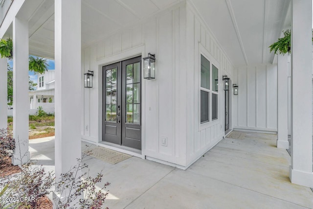 property entrance featuring covered porch