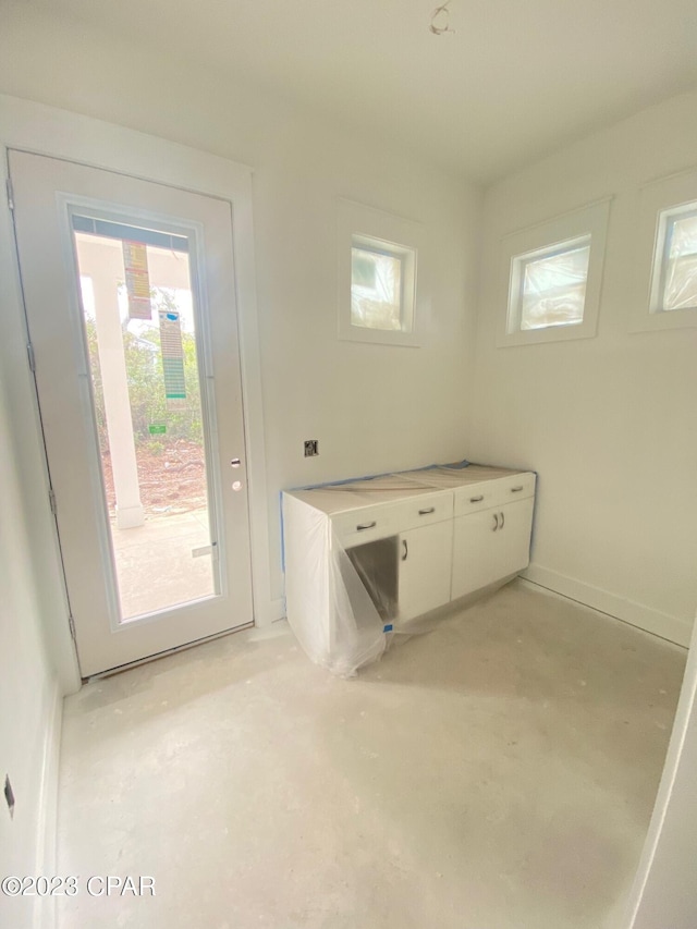 laundry area featuring a healthy amount of sunlight