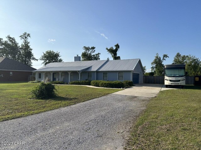 ranch-style house with a front lawn