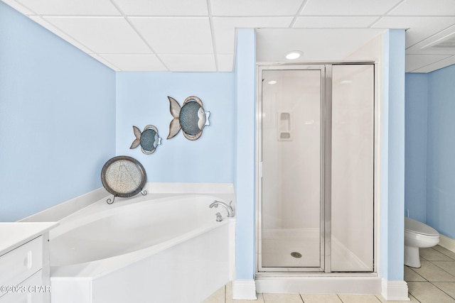 full bathroom with tile patterned flooring, a shower stall, a bath, and toilet