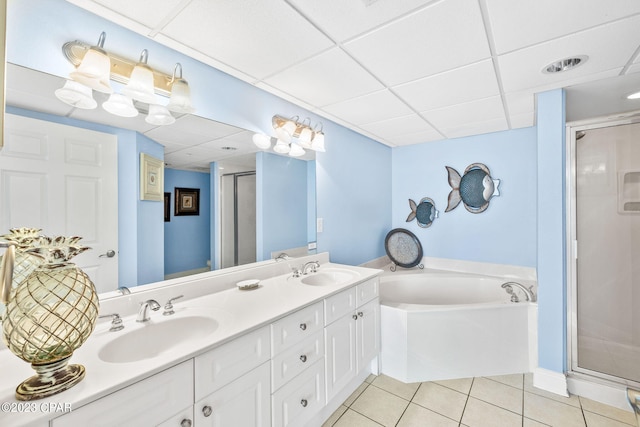 full bathroom with tile patterned flooring, a stall shower, a bath, and a sink