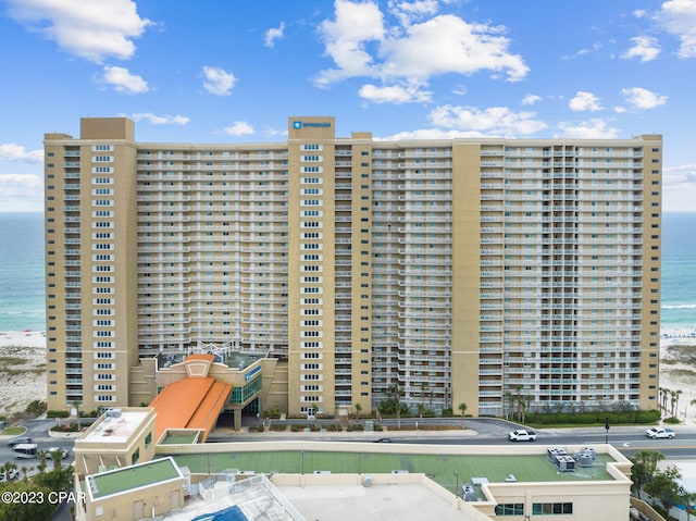 view of building exterior with a water view