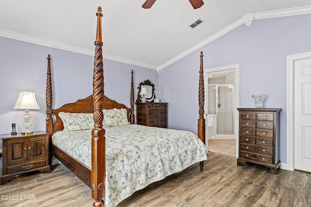 bedroom featuring crown molding and wood finished floors