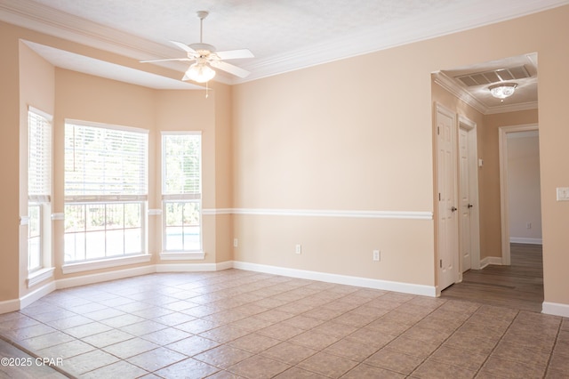 3522 Fox Run Blvd, Panama City, FL 32408 - spare room featuring a ceiling fan, baseboards, crown molding, and visible vents