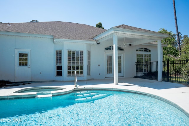 3522 Fox Run Blvd, Panama City, FL 32408 - view of swimming pool with fence, a pool with connected hot tub, a patio area, and a ceiling fan