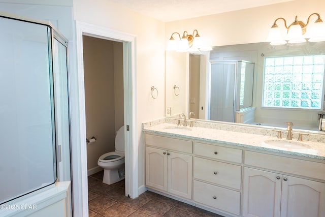 3522 Fox Run Blvd, Panama City, FL 32408 - full bath featuring a shower stall, tile patterned flooring, toilet, and a sink
