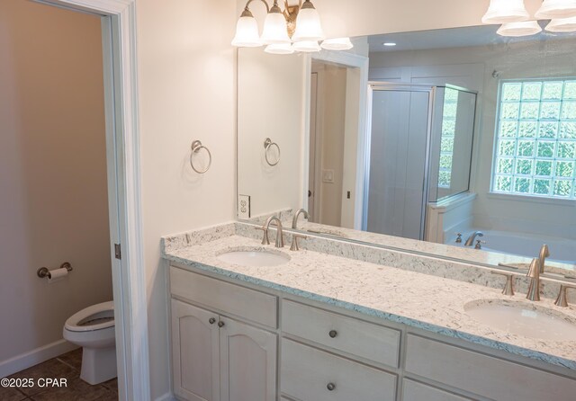 3522 Fox Run Blvd, Panama City, FL 32408 - full bath with double vanity, a shower stall, a notable chandelier, and a sink